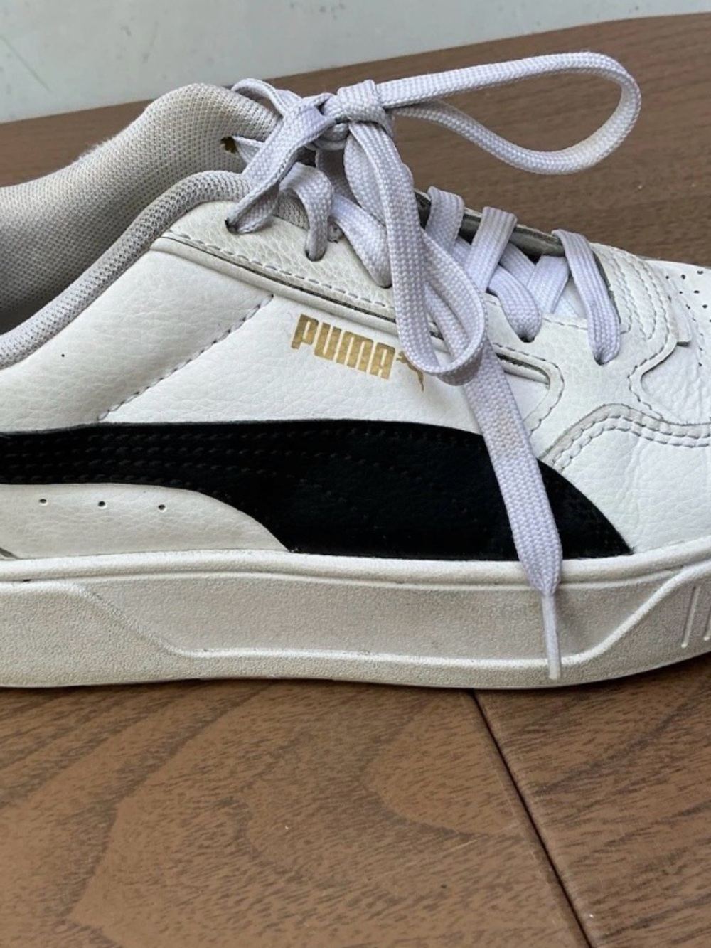 Puma White Leather Sneakers with Black Formstrip and Gold Logo